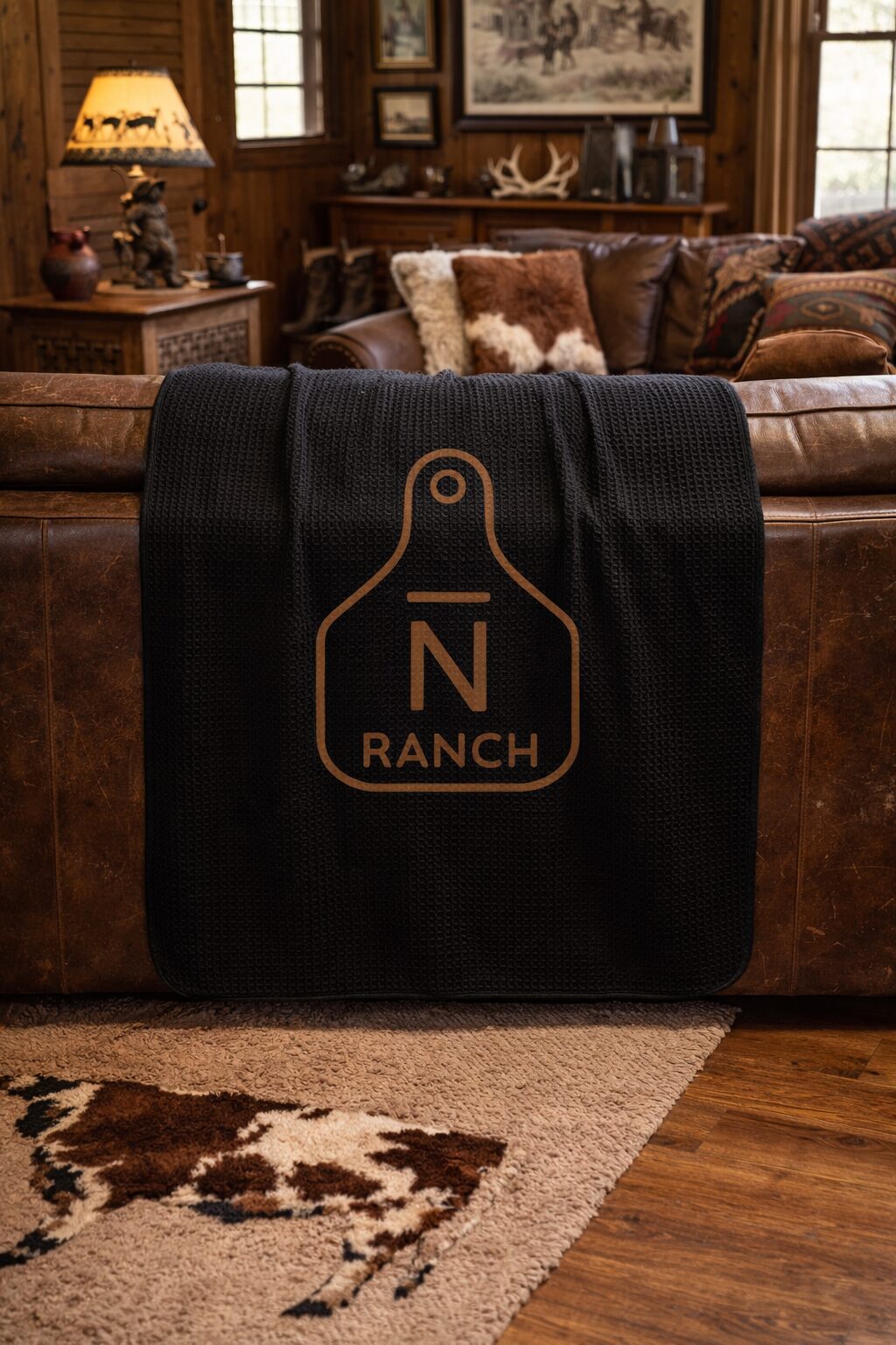 Custom ranch brand blanket with personalized livestock brand logo