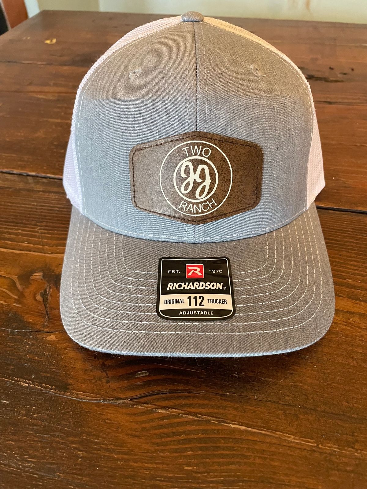 Gray cap with "Two Ranch" logo.