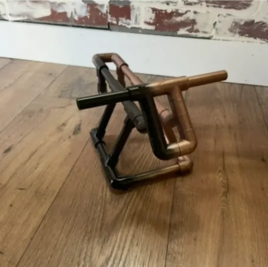 Small roping dummy for kids or beginner ropers displayed on a wooden floor
